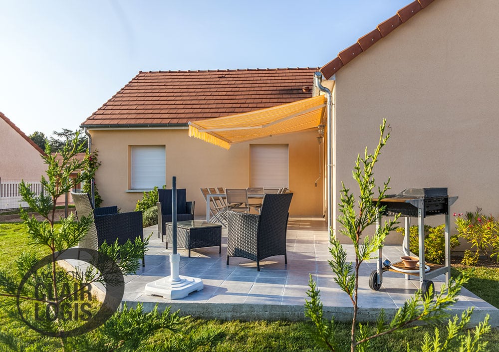 Maison en L avec terrasse